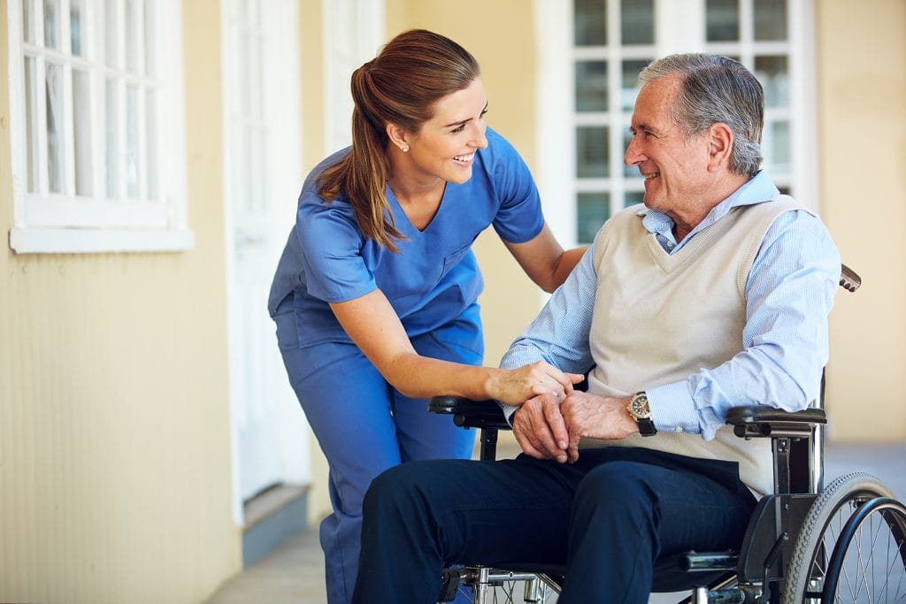 Punta Gorda home caregiver assisting a senior client during in-home care visit