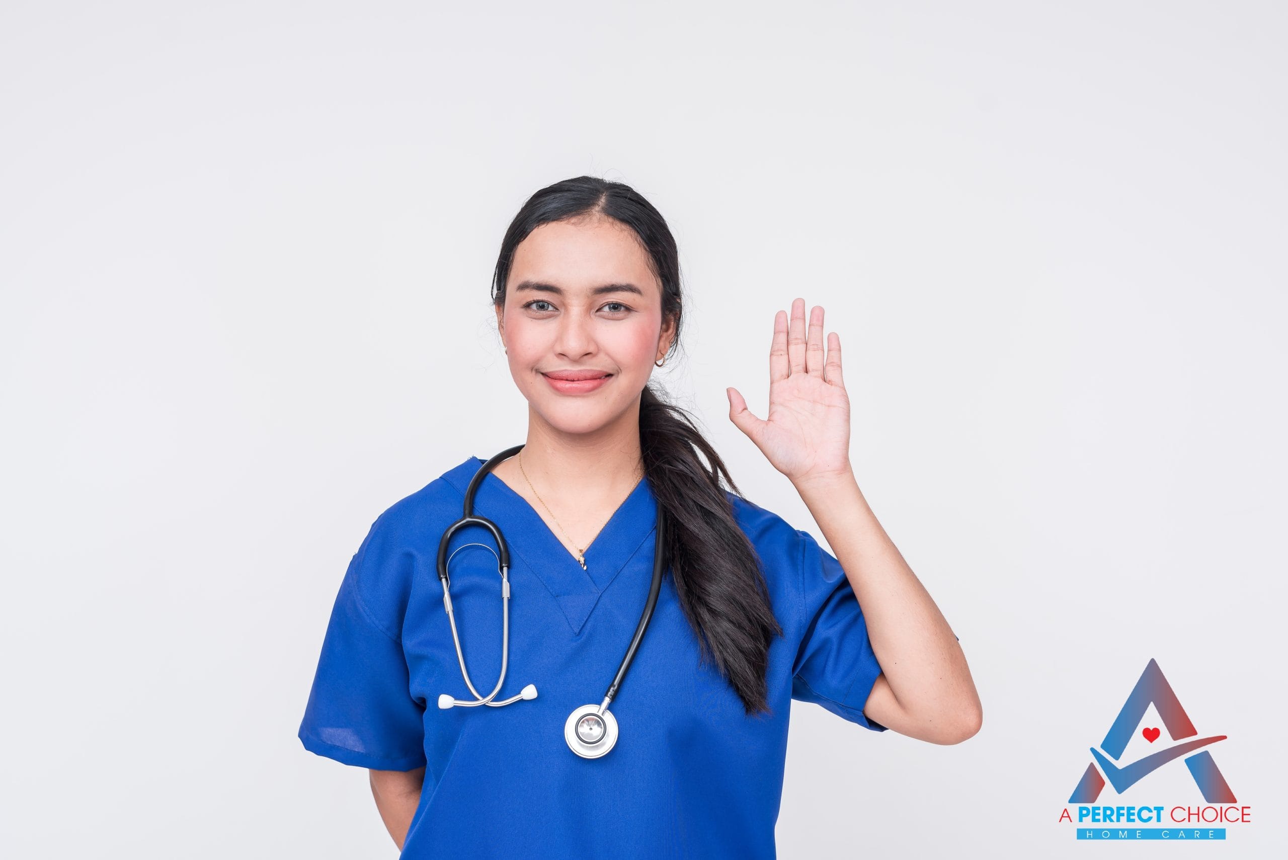 Friendly home care nurse waving and smiling, representing the compassionate caregiver team at A Perfect Choice Home Care in Florida.