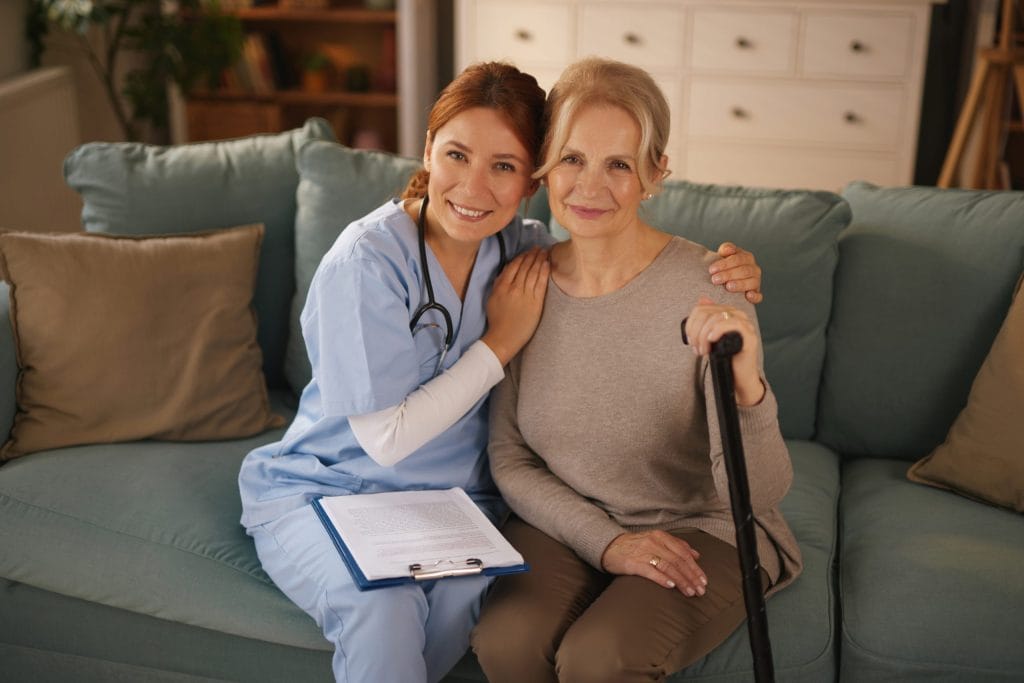 Caregiver spending time with an elderly mother at home in Southwest Florida