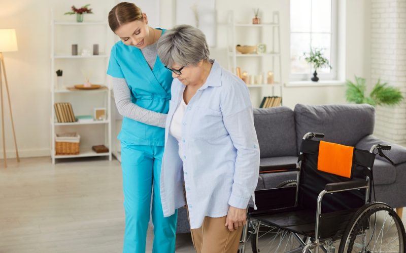 Caregiver helping a senior grandmother at home in Southwest Florida