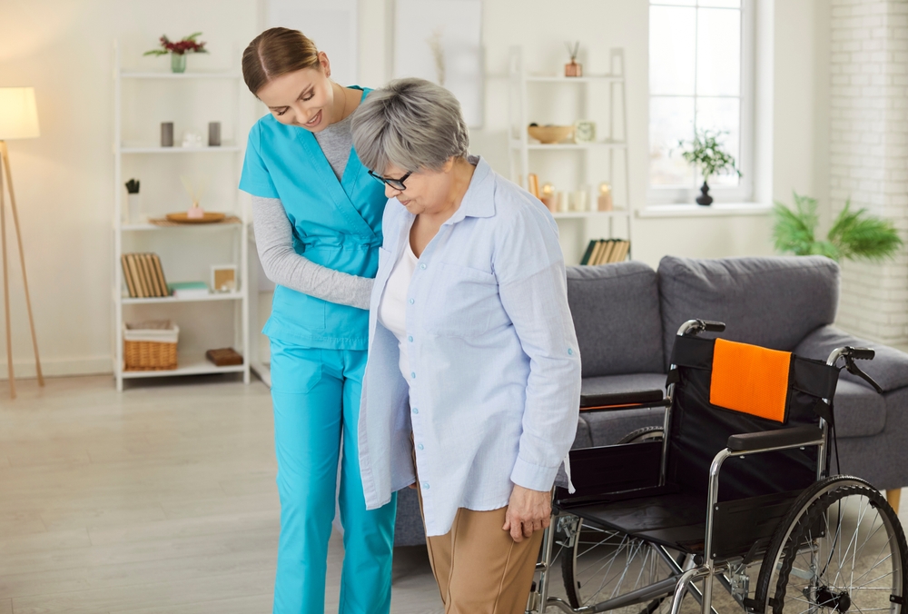 Caregiver helping a senior grandmother at home in Southwest Florida