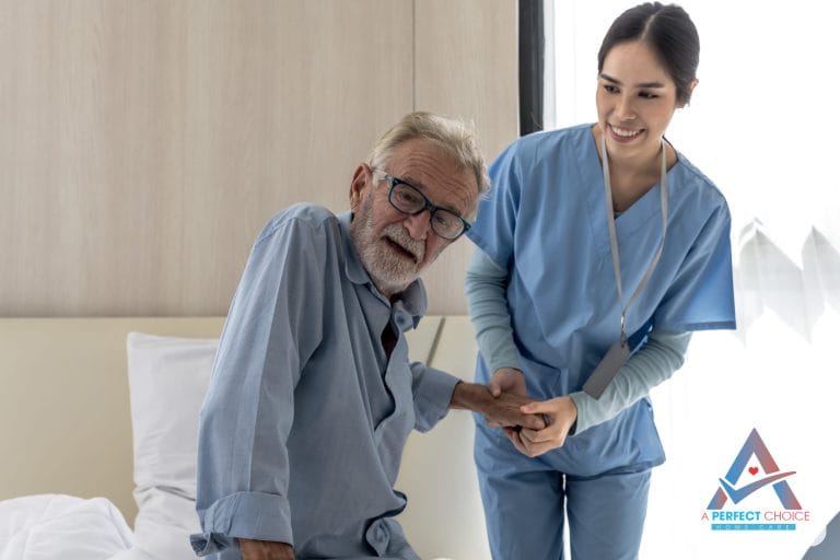 Overnight caregiver checking on a senior at home during 24-hour home care in Southwest Florida