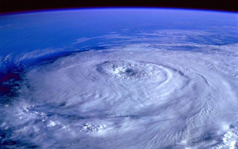 Hurricane satellite view from space showing a large swirling storm over the ocean, illustrating the 2026 Atlantic hurricane season threat to Southwest Florida